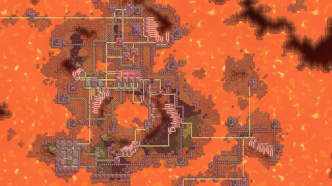 A Mindustry factory of conveyors and drills spreading across a lava field