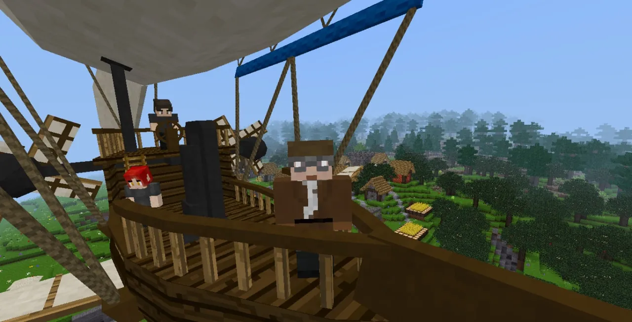 A Luanti village built by several players
